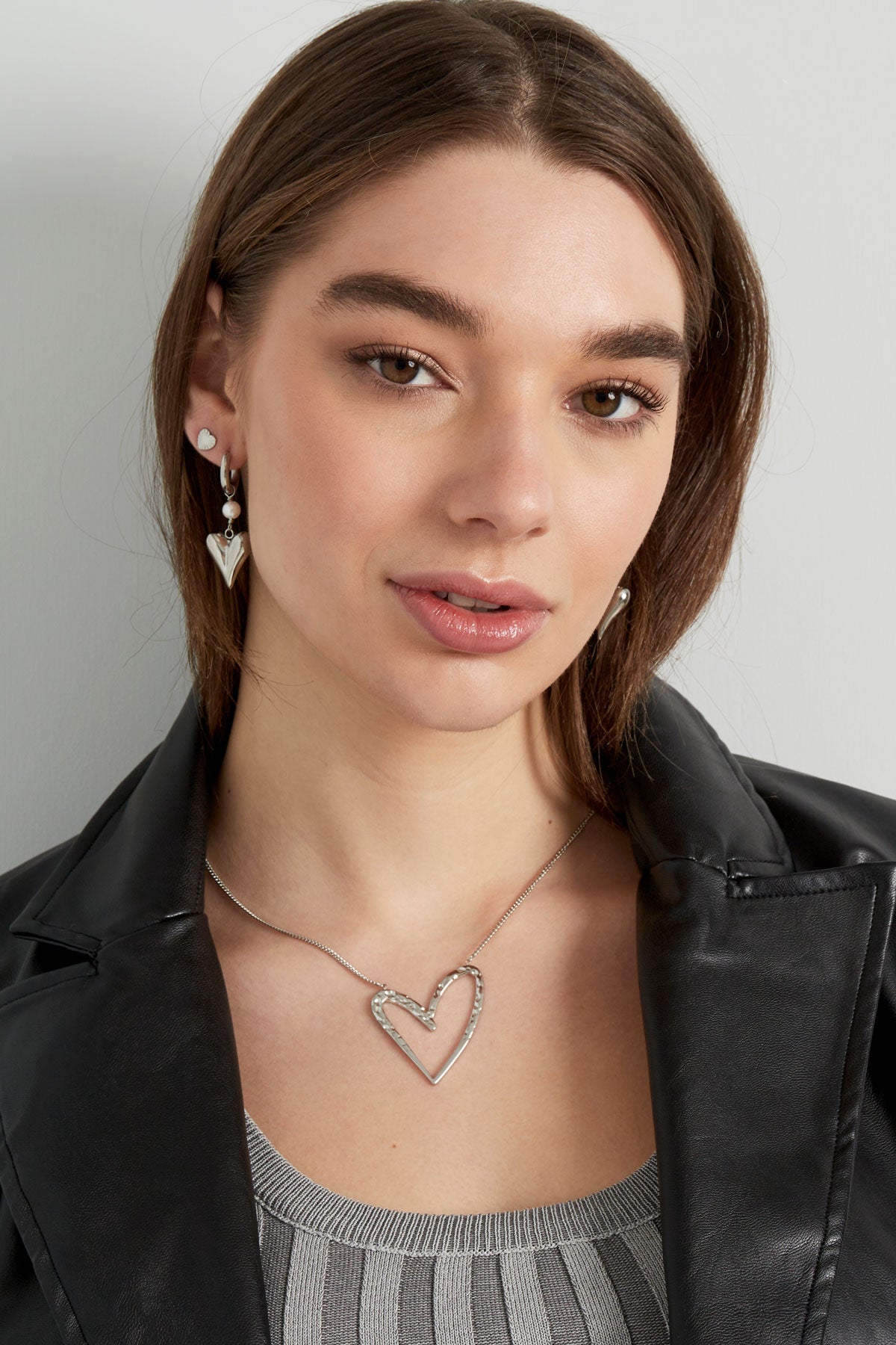 earring with pearl and heart pendant