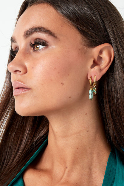 earring with black beads