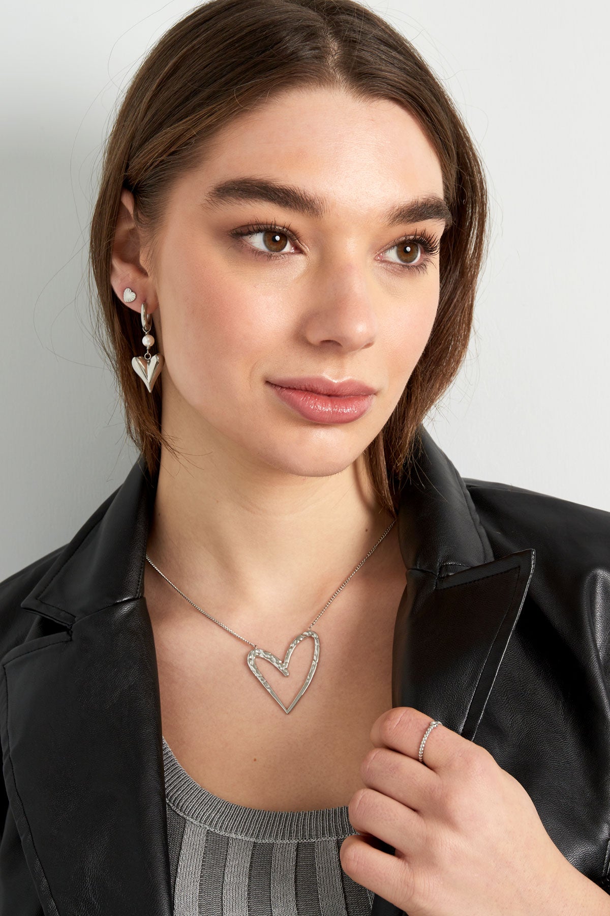 earring with pearl and heart pendant