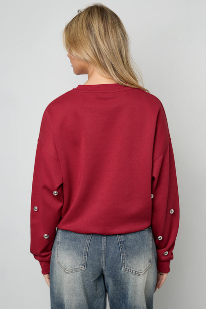 Sweater with studs